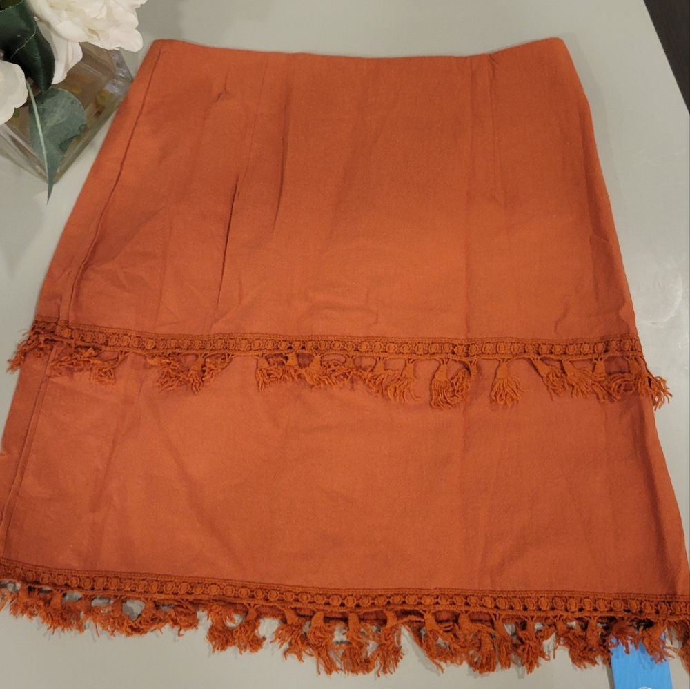 NWT fringed mini skirt Sz L deep orange Cupshe